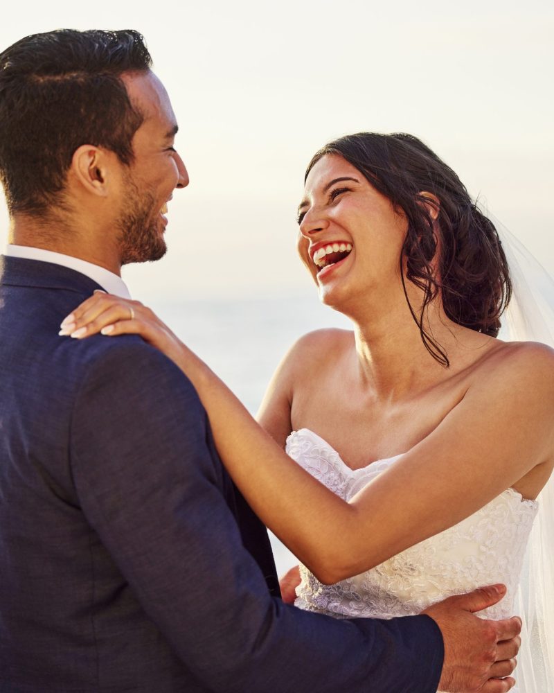 Ive never seen anything this beautiful. Shot of a young couple on the beach on their wedding day