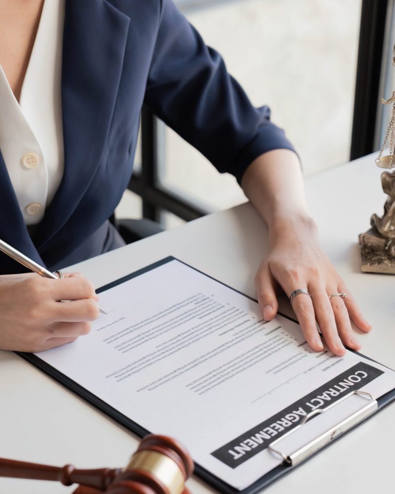 Judge gavel Justice lawyers, Business woman in suit or lawyer working on a documents. Legal law, advice and justice concept.
